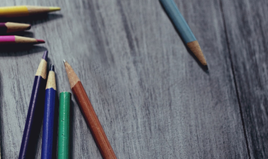 Our Work - Color Pencils on a Desk